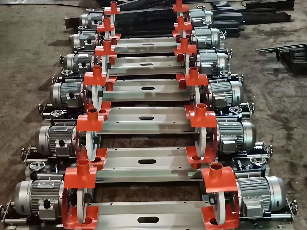 Row of squaring and edge grinding units with electric motors for a tile finishing line