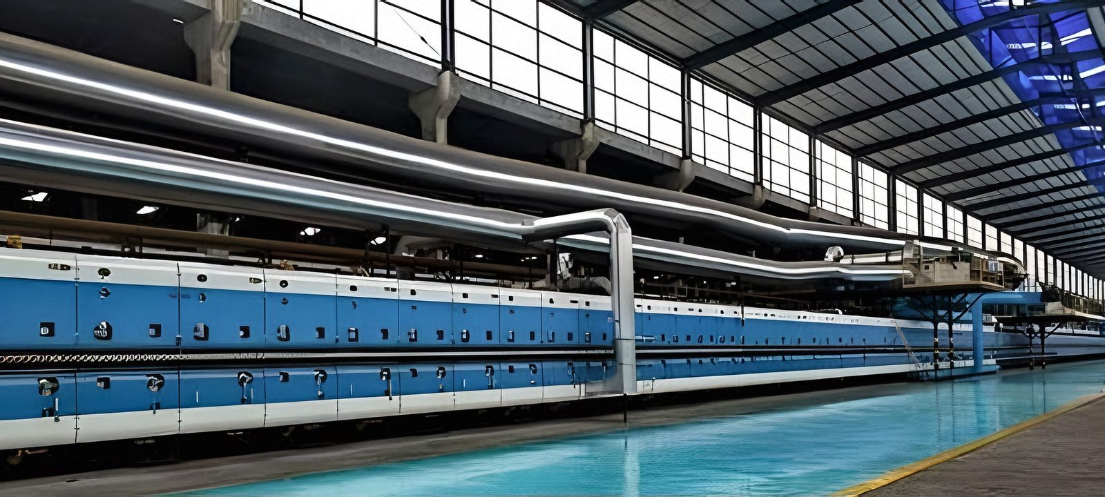 Long roller kiln in a ceramic tile factory hall